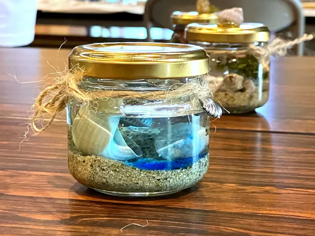 ワークショップの完成品イメージ（貝殻などのハーバリウム作り)